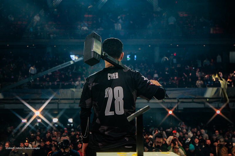 Cyber holding the trophy at the 2025 Six Invitational